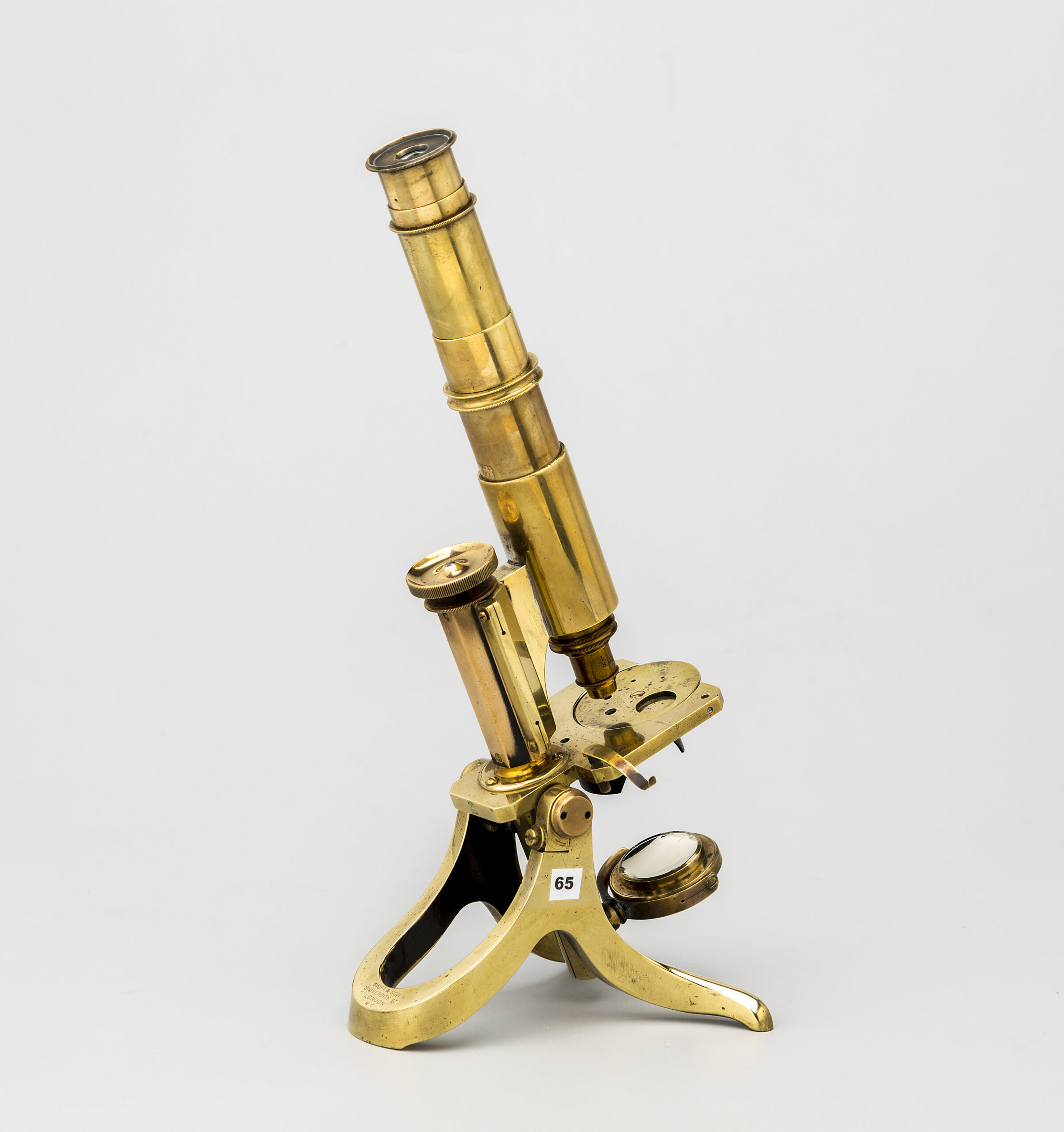 65. Microscopio monocular. J. Swift & son. University Street. Londres.